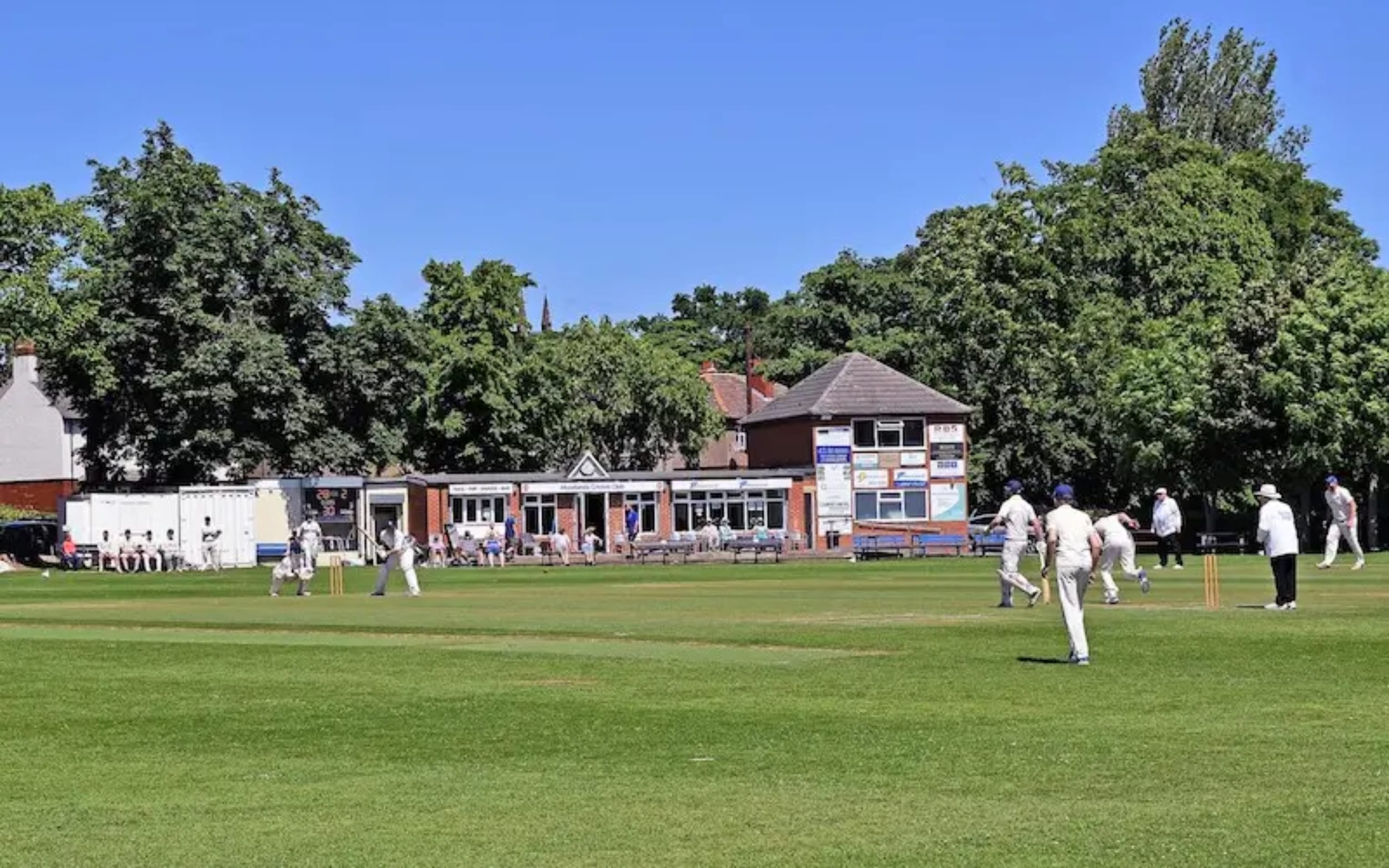 Moorlands Cricket Club View of the field, players and clubhouse of the Moorlands cricket club in Mirfield