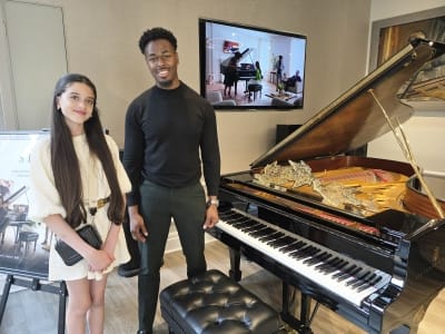 Josiah Wade and Anisa Ford Anisa Ford and Josiah Wade two of our soloists on May 17th 2026 during the Mirfield Piano Walk.